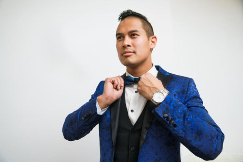 Man wearing blue silk tuxedo